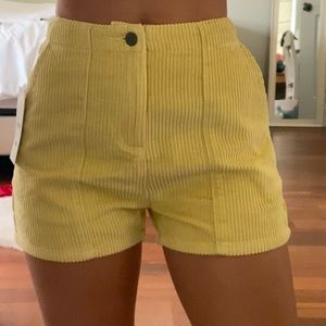 Never worn RVCA retro 70s high waisted corduroy shorts in yellow